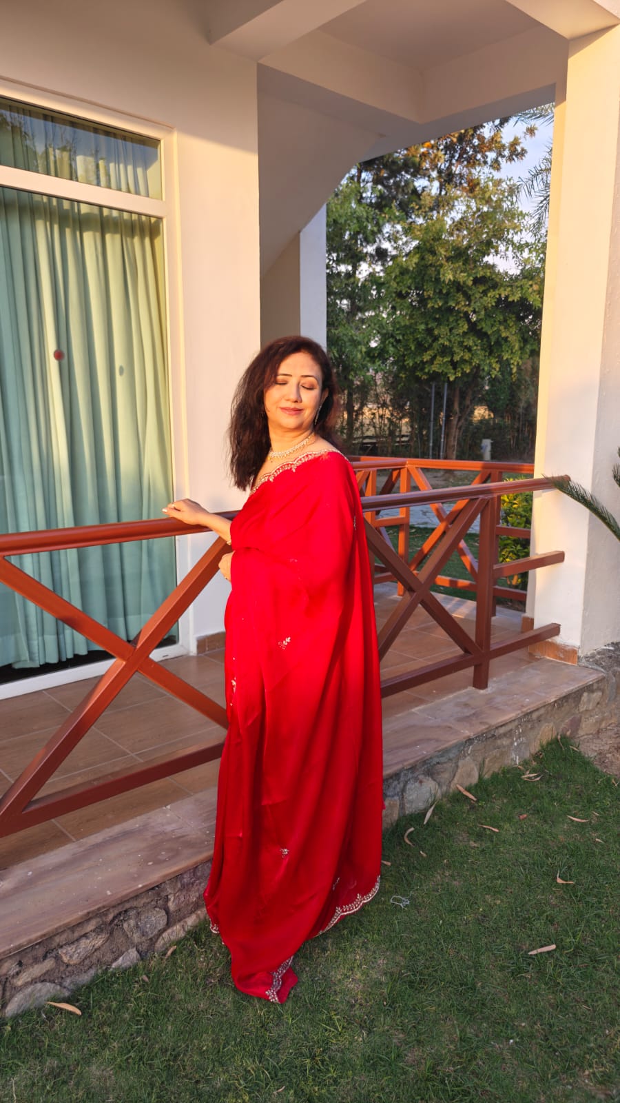 Red Organza Saree fabric shimmer detail view