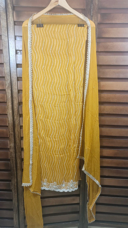 Organza Lehariya Suit yellow front view